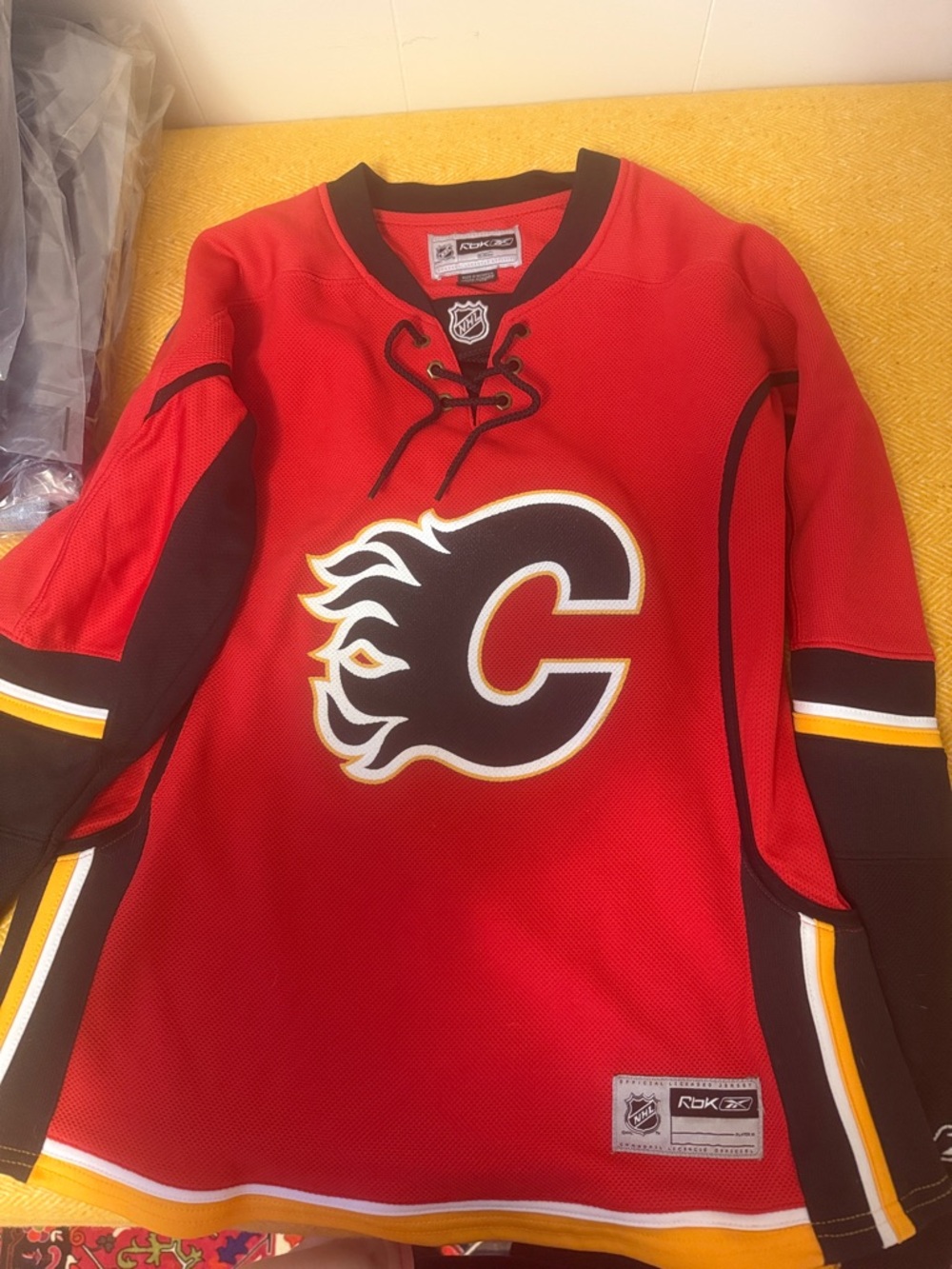 Reebok Red Calgary Flames Hockey Jersey with Black and Gold Accents